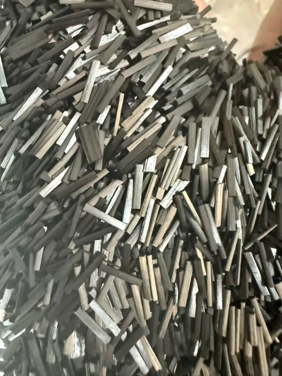 Short chopped carbon fiber strands used for carbon fiber reinforced plastic compounding